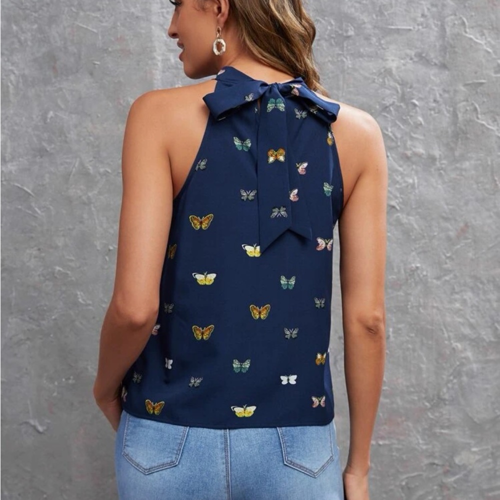 royal blue blouse, butterfly print with back drawstring neck